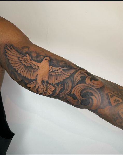 Dove Bicep Tattoo Men, Inner Bicep Bird Tattoo, Upper Bicep Tattoos For Men, Shoulder Tattoo Black Men, Outer Bicep Tattoo Men, Tattoo Black Men, Shoulder Piece Tattoo, Inside Bicep Tattoo, Arm Tattoos For Guys Forearm