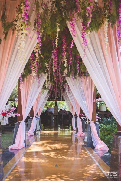 15+ Incredible Entry Walkways Into Your Wedding! | WedMeGood Wedding Reception Entrance, Budget Weddings, Reception Entrance, Wedding Reception Backdrop, Wedding Entrance Decor, Desi Wedding Decor, Marriage Decoration, Mandap Decor, Beautiful Wedding Decorations