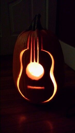 Pumpkin guitar (Halloween) Pumpkin Carving Rock And Roll, Music Pumpkin Carving Ideas, Guitar Pumpkin Carving, Music Pumpkin Carving, Cute Pumpkin Carving, Pumkin Carving, Easy Pumpkin Carving, Creative Pumpkin Carving, Pumpkin Carving Designs