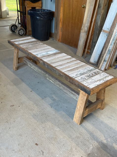 We are now living on the family farm. The original house is falling down and my husband and I recently salvaged some tongue and groove boards from the porch to make the top of the bench. All of the wood used in this bench was found on the farm. I think it turned out great. Scrap Tongue And Groove Projects, Diy Farm Bench, Barnwood Bench, Shelves Made From Old Barn Wood, Farmtable Benches, Tongue And Groove, Wood Bench, Family Farm, The Original