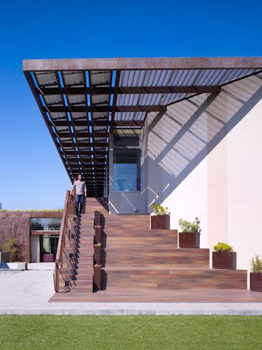 Yin Yang House  Brooks + Scarpa  Venice, CA  Bedrooms on the second floor open out onto a porch with direct access to the backyard and bamboo bleacher stairs.  Photo © John Linden Solar Awning, Architecture Antique, Patio Roof, Pergola Kits, Sustainable Architecture, Roof Design, Venice Beach, Residential Architecture, Contemporary Architecture