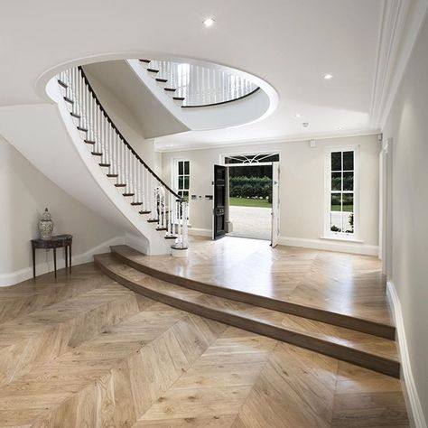 What do you think about this chevron flooring in this impressive hallway? #hall #hallway #stairs #staircase #door #floor #wood #chevron #window #woodwork #finewood #bespokejoinery #joinery #bespokefurniture #design #interior #interiordesign #architecture #home #house #luxe #luxurylife #luxuryinteriors #interior4all #hayburn #hayburnco Sweeping Staircase, Black Front Door, Floor Wood, Herringbone Floor, Entry Hallway, Curved Staircase, Style Goals, Luxury Kitchen Design, Black Doors