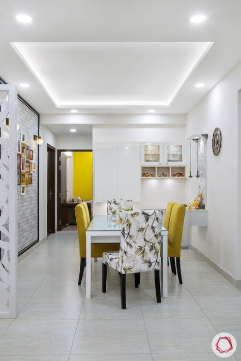 Cleo county noida_dining room with mustard yellow chairs and white crockery unit Simple House Ceiling Design, Interior Ceiling Design Bedroom, New Ceiling Design Kitchen, Fall Ceiling Designs Simple, Fallcelling Design Bedroom, Kitchen Ceiling Design Simple, Gypsum Ceiling Design Dining Room, House Ceiling Design Living Rooms Simple, White False Ceiling Design