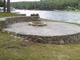 Fire Pit Flagstone, Pell City Alabama, Sitting Wall, Lake Landscaping, Fire Pit Materials, Raised Patio, Sloped Yard, Outdoor Fire Pit Designs, Fire Pit Landscaping