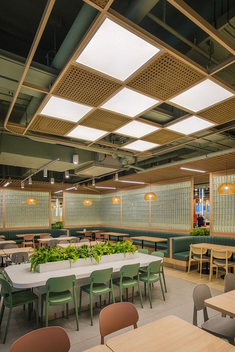 A lively food park designed by Whitespace. Staff Canteen Design, Food Hall Design Interiors, Food Court Design Outdoor, Office Canteen Design, Food Court Design Ideas, Canteen Interior Design, Food Hall Design, Food Court Interior, Resturant Interior Design