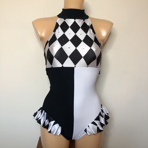 PLEASE READ ALL INFORMATION BEFORE ORDERING Robyn Hearts Training & Performance Wear. Dance, Aerial, Pole & Circus. "PIERROT-QUIN" Black & White Harlequin Pierrot Costume ~ High Neck Halter Leotard, with Colour Block Split Body Panels and Harlequin Hip Frills. Finished With Black, White and AB Crystals. Fully lined in soft beige. Matching Cuffs Available Here : https://www.etsy.com/uk/listing/1505880121/ Handmade with High Quality Patterned & Matte Lycra, Fully lined for extra support and durabi Circus Master Costume Women, Trapeze Outfit Circus, Acrobat Clothes, Clown Dance Costume, Contortionist Outfit, Circus Acrobat Outfit, Black And White Clown Outfit, Acrobatics Costume, Circus Costume Women