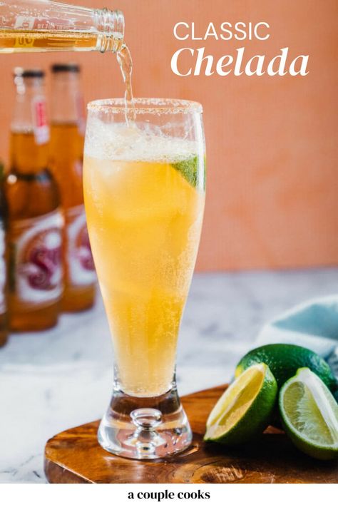 The Chelada is a Mexican beer cocktail that's easy and refreshing! This irresistible drink pairs lager with lime juice and a salt rim. #chelada #cheladarecipe #beercocktail #mexicancocktail Chelada Recipe, Beer Margarita Recipe, Friday Cocktails, Mexican Cocktails, A Couple Cooks, Beer Cocktail, Drinks Ideas, Recipes Drinks, Mexican Beer