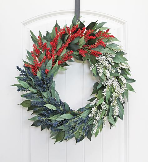 Patriotic red, white and blue berry wreath is elegantly modern and can accompany any decor style in your home. Hang it on your front door for vibrant curb appeal! Patriotic Wreaths For Front Door, Holiday House Decor, Red White And Blue Wreath, Summer Wreath For Front Door, Memorial Day Wreaths, Grapevine Wreaths, Blue Berry, Faux Greenery, Blue Wreath