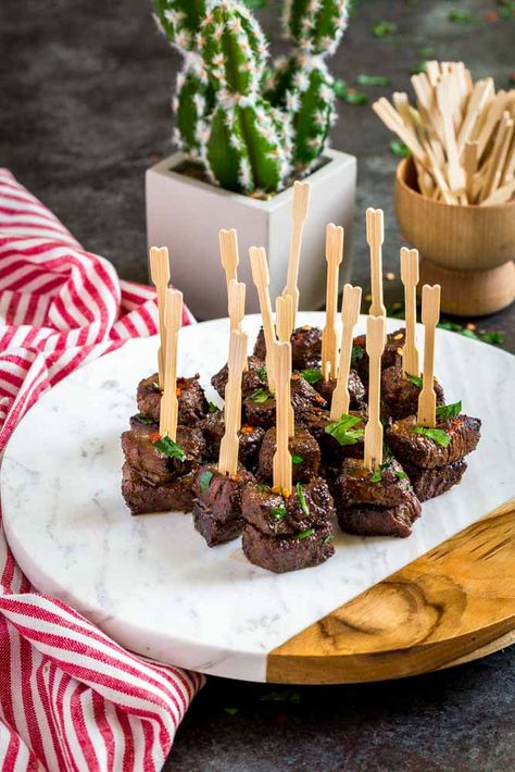 Steak Bites with Garlic Buter | Dinner or Steak Appetizers! | Confetti & Bliss Ribeye Appetizers, Meat Bites Appetizers, Steak Finger Food, Steak For Wedding, Steak Bites Charcuterie, Mini Steak Appetizers, Sirloin Steak Appetizers, Prime Rib Steak Bites, Appetizers With Steak