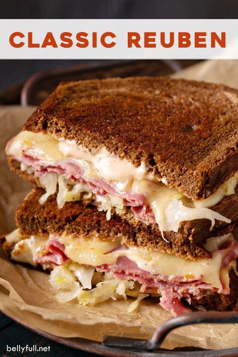 There’s just nothing quite like a classic Reuben sandwich! Enjoyed all year round, but especially on Saint Patrick’s Day, this easy recipe is composed of rye bread, corned beef, Swiss cheese, sauerkraut, and a sauce (either Thousand Island or Russian dressing.) It is undeniably unique, ooey, gooey, and amazingly delicious! Classic Reuben Sandwich, Reuben Sandwich Recipe, Reuben Sandwich Classic, Salami Sandwich, Homemade Corned Beef, Corned Beef Sandwich, Grill Sandwich, Best Sandwich Recipes, Russian Dressing