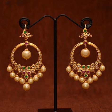 Anvi's chand bali studded with uncut stones, emeralds and rubies with pearl hangings Chand Bali, Gold Jhumka Earrings, Bali Earrings, Gold Jewelry Simple Necklace, Chandbali Earrings, Black Beaded Jewelry, Wedding Jewellery Collection, Gold Bride Jewelry, Gold Jewelry Earrings