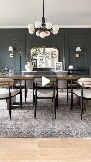 Krystal Smit on Instagram: "The making of a moody dining room 🖤 Comment SHOP and I’ll send you the links to this space!

Paint color is Iron Ore by SW! I have a Dining Room highlight saved with more details on how we did the moulding! Finished with modern and vintage inspired styling – which always has my heart.

WAYS TO SHOP:

1. Tap the blue link in my IG profile @thesmittencollective
2. Head to my LTK to shop my home
3. Go to my AMAZON STOREFRONT for Amazon pieces
4. Go to www.thesmittencollective.com to Browse My Home
.
.
.
.
.
.
.
#diningroom #moodydiningroom #darkpaint #diningroominspo #diningroomdecor #diningroomdesign #ltkhome #amazonhome" Swanky Dining Room, Moody Traditional Dining Room, Moody Dining Room Paint Colors, Iron Ore Dining Room, Dark Dining Rooms, Moody Dining Room Ideas, Moody Dining Room, Dark Dining Room, Brown Dining Room