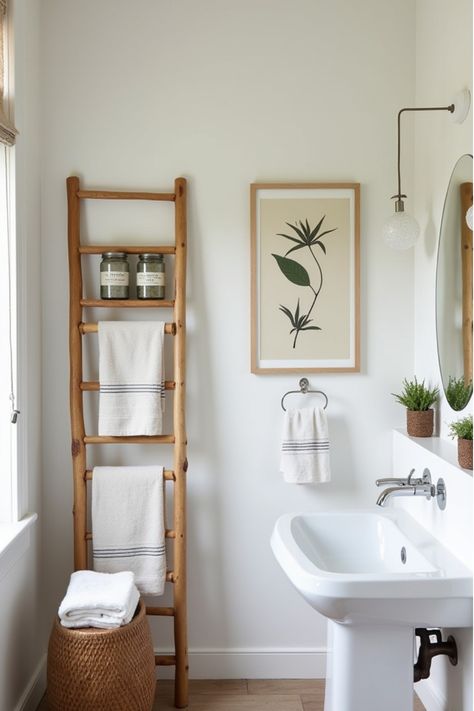 Modern bathroom corner with bamboo ladder shelf and coordinated accessories Coastal Modern Bathroom, Scandi Bathroom, Bathroom Decor Ideas Minimalist, Modern Bathroom Decor Ideas, Small Bathroom Interior, Best Bathroom Vanities, Chic Mirror, Upcycle Decor, Coastal Modern