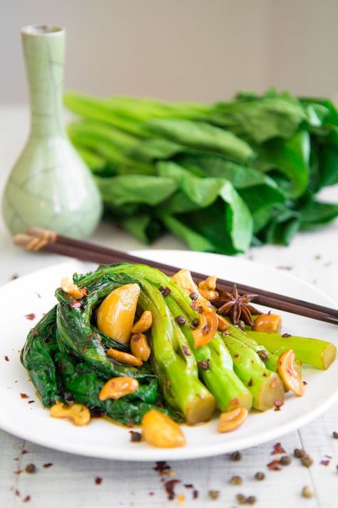 GAI LAN (CHINESE BROCCOLI) STIR FRY with Sichuan pepper and garlic Gai Lan Recipe, Chinese Delicacies, Vegetarian Chinese Recipes, Muhammara Recipe, Shanghai Style, Chinese Broccoli, Okra And Tomatoes, Chinese Vegetables, Sichuan Pepper