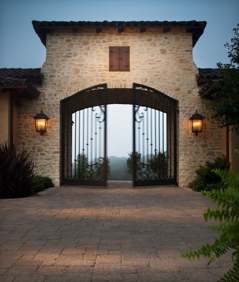 Make every entrance grand with a beautiful driveway featuring Belgard pavers. #MegaBergeracPaver Hacienda Driveway Entrance, Grand Entrance Gate, Hacienda Entrance, Ranch Gates Entrance Ideas, Stone Driveways, Ranch Entrance Ideas, Spanish Doors, Beautiful Driveways, Gated Entrance