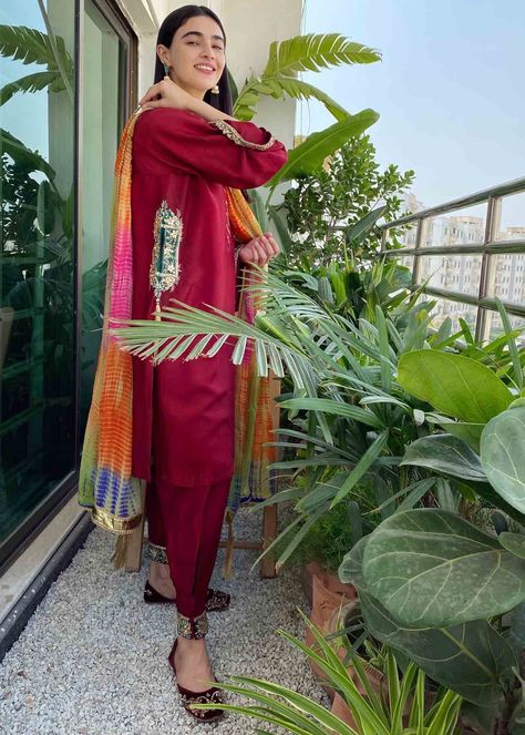 Color: Red Fabric: Kurta: Raw silk Dupatta: Chiffon Work Technique: Featuring intricate gota work Description: Our crimson pocket kurta with cuffed shalwar and multi colored chunri dupatta featuring intricate gota work from our latest Festive Collection ‘20. It is a 3 piece stitched outfit. Includes: Kurta Shalwar Dupatta Saheefa Jabbar Khattak, Pocket Kurta, Asian Wedding Dress Pakistani, Luxury Pret, Asian Wedding Dress, Eid Outfit, Trendy Shirt Designs, Gota Work, Fancy Wedding Dresses