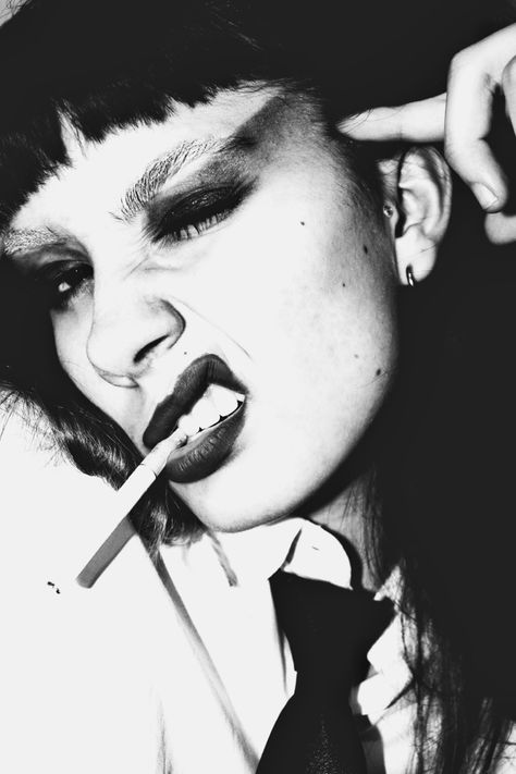 punk girl with a cigarette on a black and white photo Punk Rock Portrait Photography, Rock Star Portraits, Model Grunge Aesthetic, 70s Punk Photography, Punk Rock Portrait, Punk Film Photography, Punk Rock Editorial, 90s Grunge Editorial, Rockstar Portrait Photography