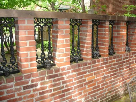 Repurposed wrought iron porch sections now "windows" in our brick fence. Wrought Iron Fence On Brick Wall, Brick Wall Fence, Brick Fence Ideas, Brick Fences, Brick Wall Gardens, Wall Gardens, Boundary Wall, Brick Fence, Wall Fence