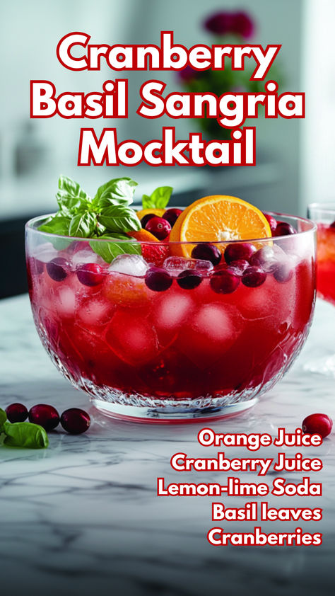 The Cranberry Basil Sangria Mocktail is a refreshing, fruity drink that combines the tartness of cranberry juice with fresh orange, apple, and strawberry. Infused with basil for a unique herbal twist, this mocktail is perfect for any festive gathering, offering a beautiful, non-alcoholic alternative to traditional sangria.  #cranberrybasilsangriamocktail #thanksgivingmocktails via @mybartender Alcohol Free Sangria Recipes, Fresh Cranberry Cocktail, Mocktail Sangria Non Alcoholic, Herb Infused Mocktails, Cranberry Orange Mocktail, Cranberry Mocktail Non Alcoholic, Grape Mocktail, Mocktail Sangria, Thanksgiving Mocktails