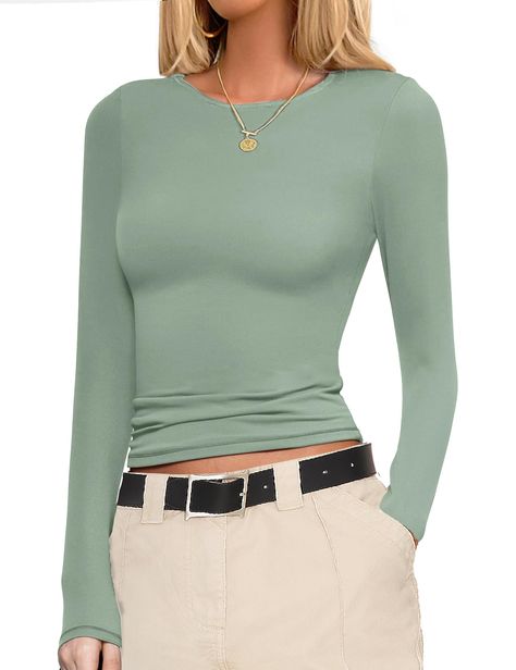 PRICES MAY VARY. Classic & Special Length Design - This long sleeve thermal tops features a boat neck design and a Shorter basic T-shirt length. Its adaptability shines as it effortlessly transitions from a tucked-in inner layer to a stylish crop top when stacked at the waist, making it a must-have piece for those seeking to channel the fall fashion trend. Ultimate Comfort Thermal Tops - The fabric is soft, skin-friendly and smooth to touch. Four-way stretching provides excellent elasticity and Shopping List Clothes, Fitted Tops, Stylish Crop Top, Green Long Sleeve Shirt, Green Long Sleeve Top, Clothing Shopping, Green Long Sleeve, Girls Wardrobe, Womens Long Sleeve Shirts