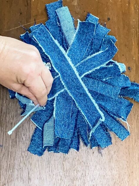 Add a little denim and diamonds to your home decor with this messy bow DIY. This adorable bow can be added to banners and wreaths, or even attached to a vase for a little whimsy. So gather some old jeans and let's get crafting! #southerncrushathome #denimmessybowdiy #diymessybow Jean Crafts Ideas Simple, Shabby Flowers Diy How To Make, How To Make Denim Flowers, Jean Flowers Diy, Denim Bows Diy, Denim Flowers Diy Tutorials, Denim Jewelry Diy How To Make, Diy Denim Flowers, Messy Bows Diy