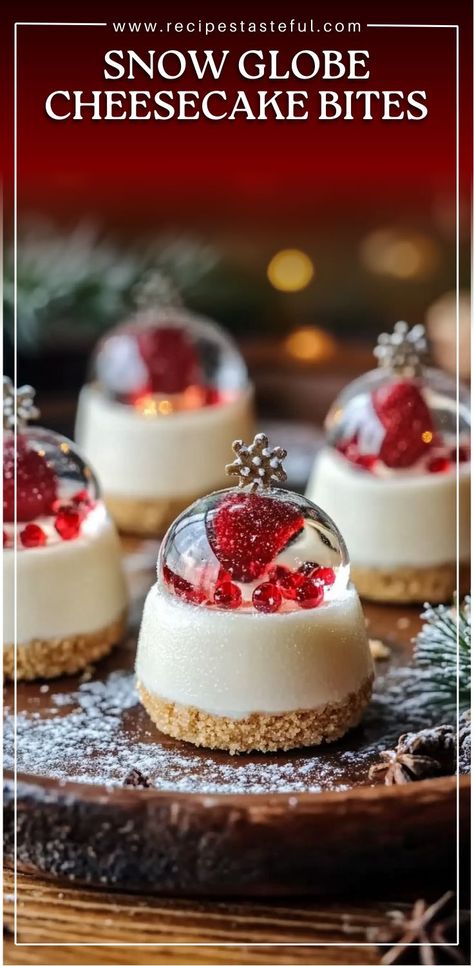 These adorable Snow Globe Cheesecake Bites are a festive treat that combines a creamy cheesecake filling with a crunchy cookie crust and a charming snow globe topper. A small fondant snowman enclosed within a clear gelatin dome creates the perfect winter wonderland effect. Ideal for holiday parties or as a sweet surprise for family gatherings. Clear Gelatin Recipe, Christmas Cheesecake Bites, Snowman Recipes, Christmas Cheesecake Recipes, Globe Cake, Mint Desserts, Christmas Cheesecake, Gelatin Recipes, Dessert Items