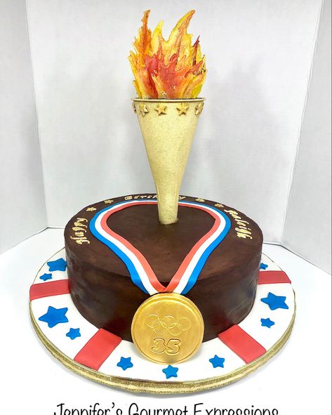 Olympics themed cake, Olympic torch cake, gold medal cake Gold Medal Cake, Olympic Cake, Olympic Snacks, 3 Ingredient Fruit Cake Recipe, Backyard Olympics, Summer Olympics Party, Fair Cake, Golden Bday, Olympics Party