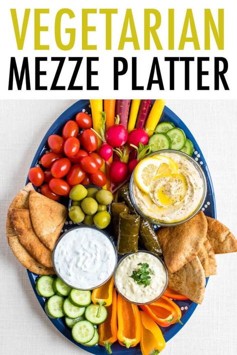 Learn how to build an epic vegetarian mezze platter with hummus, tzatziki, fresh vegetables, olives and pita! This Mediterranean snack plate works great as an appetizer for potlucks and dinner parties.  #mezze #mezzeplatter #appetizer #healthyrecipe #Mediterranean Vegetarian Mezze, Greek Mezze, Hummus Appetizers, Mediterranean Snacks, Vegetarian Party, Hummus Platter, Mezze Platter, Roasted Eggplant Dip, Eating Bird Food