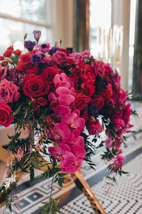 sweetheart table, sweetheart table flowers, fuchsiaflowers, bright wedding decor, orchid wedding flowers, wedding centerpiece, wedding flowers, pink and purple flowers, pink and red flowers #luxurywedding #everlieco #weddingcenterpiece #sweethearttable #weddingflowers Fuschia Flowers Wedding, Magenta Floral Arrangements, Fuschia Wedding Decorations, Fuschia Wedding Flowers, Bright Wedding Decor, Magenta Wedding Colors, Dark Pink Wedding, Orchid Wedding Flowers, Fuchsia Wedding Theme