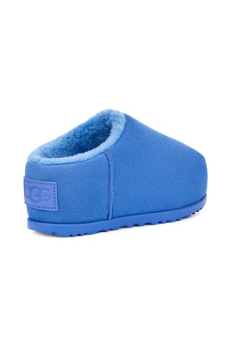 Go ahead, be extra in this fearless slipper with signature UGG coziness and a maximalist vibe. The padded upper gives pillowy comfort and is wrapped in genuine suede, while plush faux fur and a cushy footbed inside make it so, so comfortable. Ugg Slippers, Go Ahead, Slide Slipper, Womens Slippers, Faux Fur, Slippers, Pumps, Blue