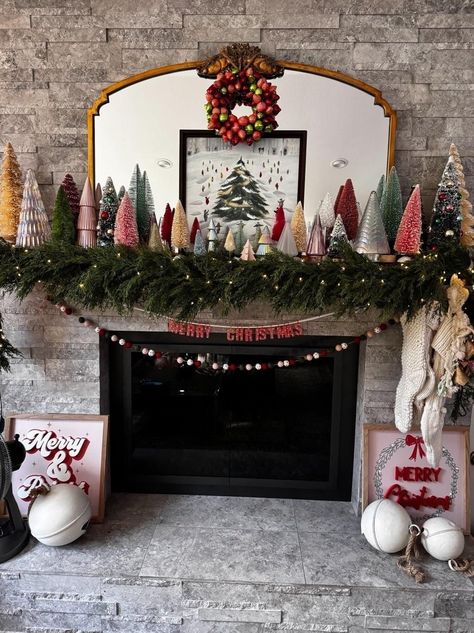 Fire Mantel Christmas Decor, Christmas Decorations Entertainment Center, Gold Bells On Mantle, Mantle Mirror Christmas Decor, Holiday Decor Mantle, Modern Christmas Mantel, Christmas Tree Mantle Decor, Traditional Christmas Mantle Decor, Christmas Floating Shelves Decor