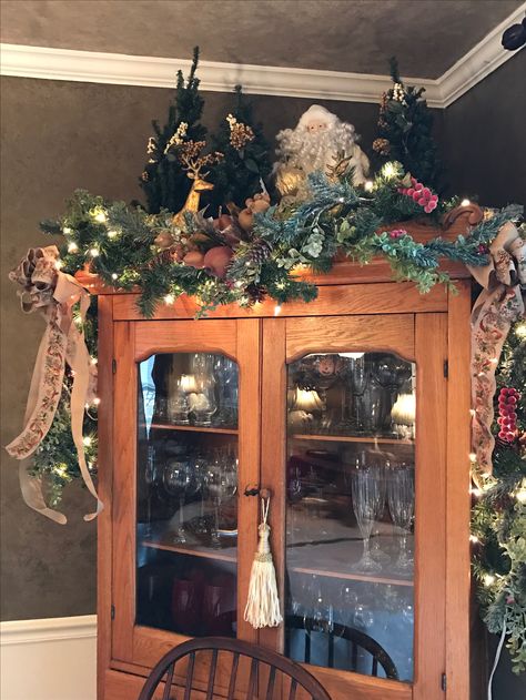 You can make a holiday vignette on any horizontal surface - this is the top of an antique china cabinet in our dining room. Decorate Top Of China Cabinet, Decor With Lanterns, Christmas Hutch, Antique China Cabinet, Angel Magic, Antique China Cabinets, Top Of Cabinets, Cabinet Top, Decor 2023