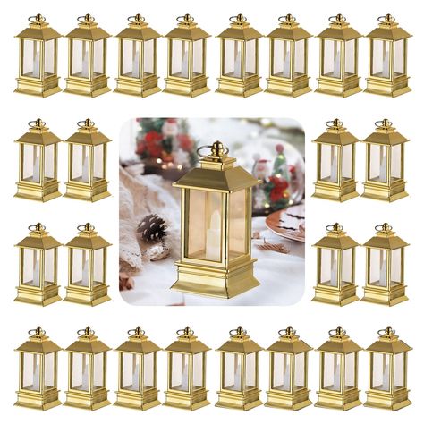 PRICES MAY VARY. Mini Lantern: These small mini lanterns are cute and compact with 4 clear plastic panels and LED candles that add a wonderful atmosphere to your table. Set of 24 rustic lanterns with dimensions: 1.69"D x 3.54"H which is made of premium ABS plastic, reliable enough fit for home decor. Long Lasting: The mini lantern features a convenient switch at the bottom for easy on/off control. Each lantern includes 3 button cell batteries (included, LR44), providing up to 48 hours of use. No Hanging Lantern Decor, Lantern Home Decor, Tiki Lights, Candles Vintage, Lighted Centerpieces, Lantern Decor, Mini Lanterns, Gold Lanterns, Wedding Halloween