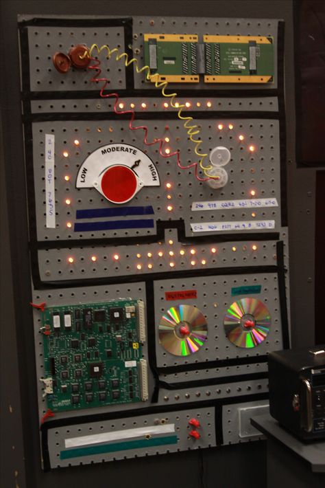 Light board/panel - command center Peg board Space Command Center, Diy Mission Control Panel, Inside Of A Spaceship, Rocket Ship Control Panel, Space Control Panel, Stellar Vbs Decorations, Vbs Stellar Decorations, Vbs Space Theme Decorations, Mission Control Panel