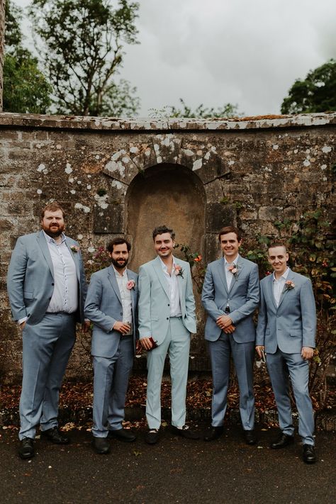 light blue groom and groomsmen suits Grooms Summer Suit, Heather Blue Suit, Mismatched Blue Groomsmen, Light Blue Groom Suit Navy Groomsmen, Pale Blue Bridesmaid Dresses With Groomsmen, Steel Blue Groomsmen Attire, Groomsmen Spring Wedding, Light Blue Mens Suit, Groom Blue Suit Wedding