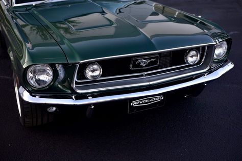 This is a 1968 Mustang GT 2+2 Fastback RHD in Highland Green Metallic. It has Black Nappa leather interior. This car has 17x8 American Racing Torq Thrust VN215 wheels. It features a 460hp Ford 5.0L Ti-VCT Coyote DOHC V8 engine and a Ford 10R80 10-speed electronically controlled automatic transmission. #mustang #shelby #classicmustang #classicshelby #carinspiration #green #greencar #classiccar Green Mustang Aesthetic, Ford Mustang Shelby Gt500 Green, Dark Green Mustang, 1968 Mustang Gt, Green Mustang, Ford Mustang 1968, 1968 Ford Mustang Fastback, Ford Mustang 1967, 1968 Mustang