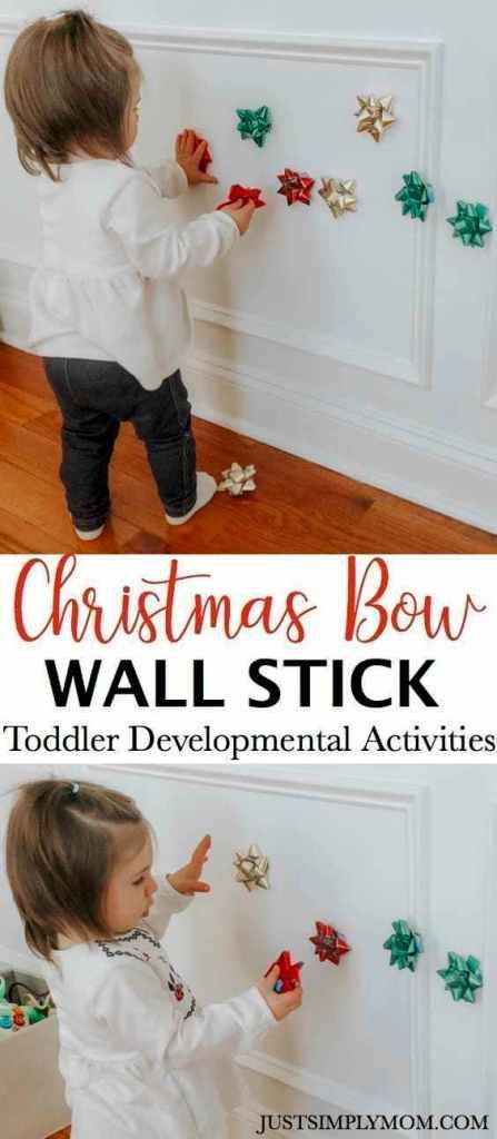 Christmas Bow Wall Stick Toddler Activity - Just Simply Mom Daycare One Year Old Room, Christmas With A Toddler, Christmas Activities For Babies, Baby Activities 1 Year, Xmas Activities, Christmas Activities For Toddlers, Bow Wall, Holidays With Toddlers, December Activities