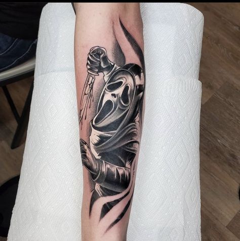 Ghostface tattoo on forearm Scream Tattoo Ghostface Sleeve, Ghost Face Forearm Tattoo, Ghostface Sleeve Tattoo, Scream Themed Tattoo, Horror Forearm Tattoo, Ghostface Thigh Tattoo, Tattoo Dbd, Wierd Tattoo, Ghostface Tattoo Ideas