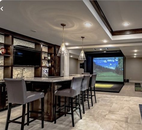 Game Room With Golf Simulator, Golf Simulator With Bar, Golf Basement Man Cave, Golf Simulator Room With Bar, Golf Simulator And Movie Room, Basement With Golf Simulator, Golf Simulator Man Cave, Indoor Golf Simulator Man Cave, Basement Golf Simulator Room