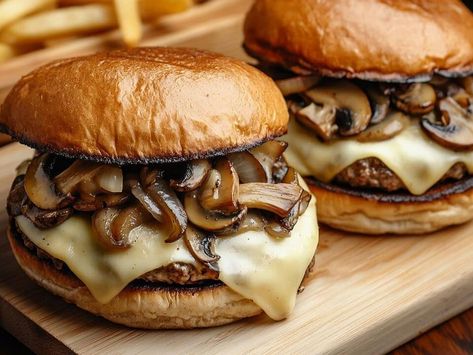 Juicy Mushroom Swiss Burger Recipe – The Best Melt-in-Your-Mouth Burger You’ll Ever Taste - NewsBreak Mushroom Swiss Burger Recipe, Swiss Burger, Mushroom Swiss Burger, Crispy Sweet Potato Fries, Onion Burger, Parmesan Cream Sauce, Crispy Sweet Potato, Beef Patties, Truffle Fries