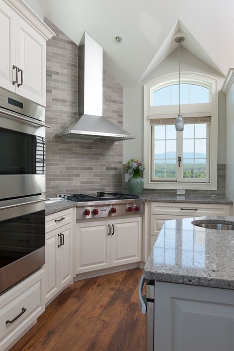 Kitchen in Rindge, NH. Knowing that the view of Mt Manadnock was critical to our clients, we incorporated a Wolf corner cooktop in the key spot so that when standing in front of it you have an unobstructed view across the valley to the mountain.   www.gmroth.com Corner Stove, Corner Stand, Kitchen Backsplash Designs, Farm Kitchen, Kitchen Corner, Kitchen On A Budget, Trendy Kitchen, Kitchen Knife, Kitchen Remodel Idea