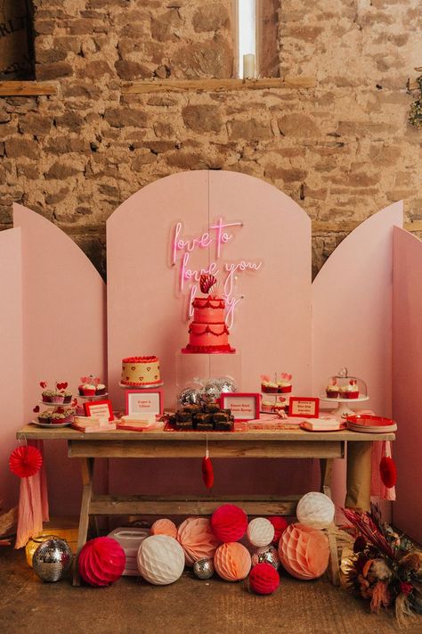 Dessert wedding table with pink screen backdrop and pink neon sign with a two tier hot pink and red retro wedding cake with paper lanterns and disco ball decor Retro Wedding Cakes, Wedding Platform, Pink Neon Sign, Metallic Wedding, Vegan Wedding, Honeymoon Fund, Rock My Wedding, Neutral Wedding, Retro Wedding