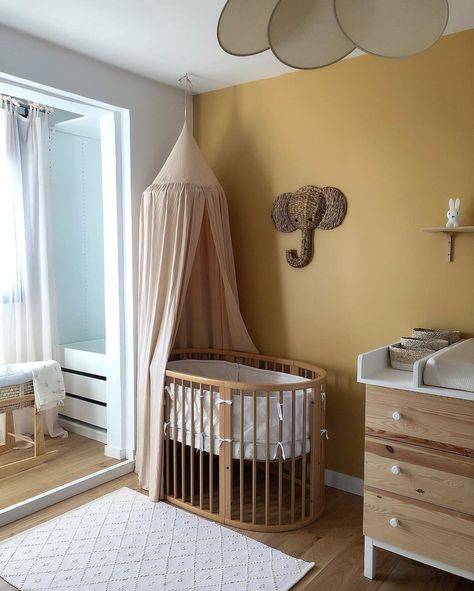 Stokke on Instagram: “#NurseryInspo of the day ✨ These warm colors combined with natural elements really emphasize the coziness of our Sleepi Bed in natural…” Oval Crib Nursery, Round Nursery Bed, Stokke Nursery Room, Stokke Crib Nursery, Nursery With Stokke Crib, Oval Cot Nursery, Stokke Sleepi Nursery, Stokke Crib, Natural Crib