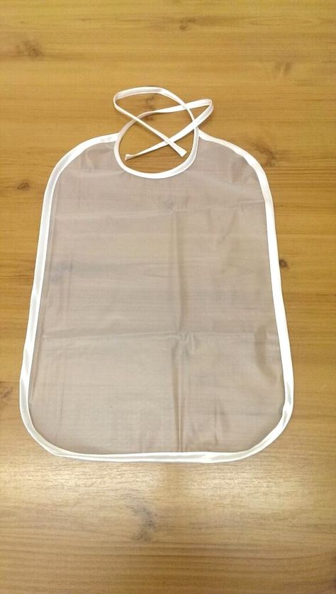 Plastic bibs for adults Plastic Bibs Adult, Plastic Bibs, Baby Gifts To Make, Clear Plastic, Baby Wearing, Bibs, Binding, Baby Gifts, Apron