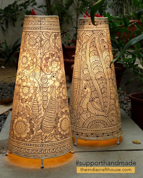 This beautifully crafted set of hand painted lamp shades are a lovely home accent, to add that extra touch of class to your decor. The translucent leather painting art form from Andhra Pradesh was originally used to make puppets for the popular shadow-puppet theatre tradition of Andhra Pradesh -‘Tholu Bommalata’- literally meaning “the dance of leather dolls Tholu Bommalata Designs, Lamp Shade Diy Ideas, Lamp Painting Ideas, Lamp Shade Painting, Hand Painted Lamp Shades, Indian Lighting, Leather Lamps, Creative Lamps Diy, Painted Lamp Shades