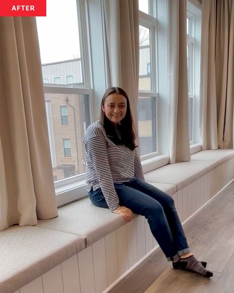 A dweller poses on the completed bench seating with hidden storage. Diy Checkerboard, Plants Apartment, Ikea Hack Storage, Diy Bench Seat, Living Room Accent Wall, Storage Hack, Ikea Built In, Carlton House, Custom Bench Cushion