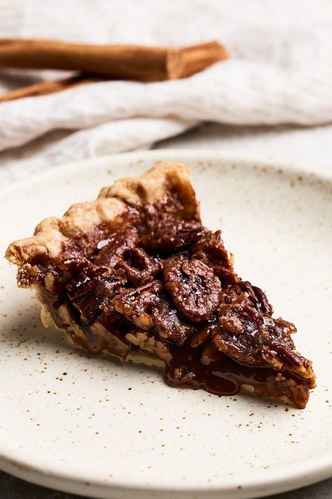 This vegan pecan pie comes together with just 10 ingredients, most of which are pantry staples! Made without eggs or corn syrup, it has a rich, crunchy, caramel-like filling with a perfectly flaky crust. It bridges the gap between plant-based treats and classic holiday favorites in an unbelievably delicious way. #veganpecanpie #pecanpie #vegandesserts Eggless Pecan Pie, Vegan Churros, Pecan Pie Recipes, Chamoy Candy, Dessert Recipes Crockpot, Vegan Peach Cobbler, Best Pecan Pie Recipe, Crunchy Caramel, Vegan Pecan Pie