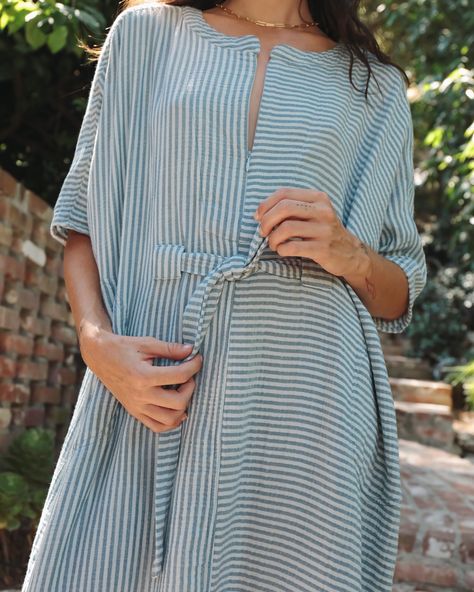 She’s here! Our most coveted silhouette since its launch in 2022, Our Rüya Tunic is finally here in Oddbird’s shades of summer; Stunning Olive and Ocean Blue! With day-wear in mind, we leaned into the origins of the original Ruya contrast-stripe design as we set to weave an unforgettable, opaque 100% cotton gauze that provides both breathability, texture and coverage in the most divine tonal blue stripe, Oddbird’s ode to the summer nautical stripe. A nod to evening and cocktail-wear, our O... Striped Kurta, Cocktail Wear, Business Casual Outfits For Work, Dress Linen, Long Dress Casual, Home Dress, Abaya Fashion, Maternity Dress, Business Casual Outfits