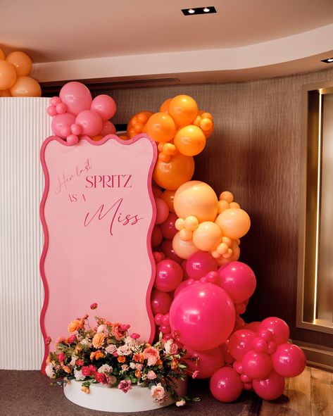 Aperol Spritz Themed Bridal Shower- Her Last SPRITZ as a MISS 🍹 🍊 We really love this theme! It was a pleasure working with you, Vicki! You and your guests were STUNNING! 🧡 • • • Backdrops, All Balloons & Backdrop Flowers: @decorandvibes • Backdrop Decal: @signedbytobs • Photographer: @samuelbass • • #ottawa #orange #hotpink #balloongarland #613 #ottawaevents #bridalshower #bridetobe #aperolspritz #aperolspritztheme #pink #fuschia #ottawabridalshowers #ottawaeventdecor #sohochampagne #ot... Orange Pink Party Theme, Pink Orange Backdrop, Hens Balloons, Aperol Spritz Bridal Shower Theme Backdrop, Pink And Orange Hens Theme, Orange Pink Decor, Pink And Orange Bachelorette Party Theme, Pink Orange Bridal Shower Theme, Aperol Spritz Hen Party