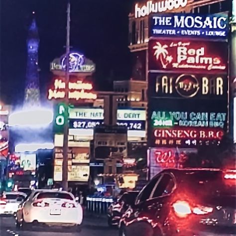 White Mk4 Supra driving on the Las Vegas Strip, lots of billboards, buildings, and city lights in the background 90s Night Aesthetic, 90s Las Vegas, 80s Las Vegas, Las Vegas Aesthetic Night, Las Vegas 2000s, Supra Car, Las Vegas At Night Wallpaper, Trashy Aesthetic, Vhs Aesthetic